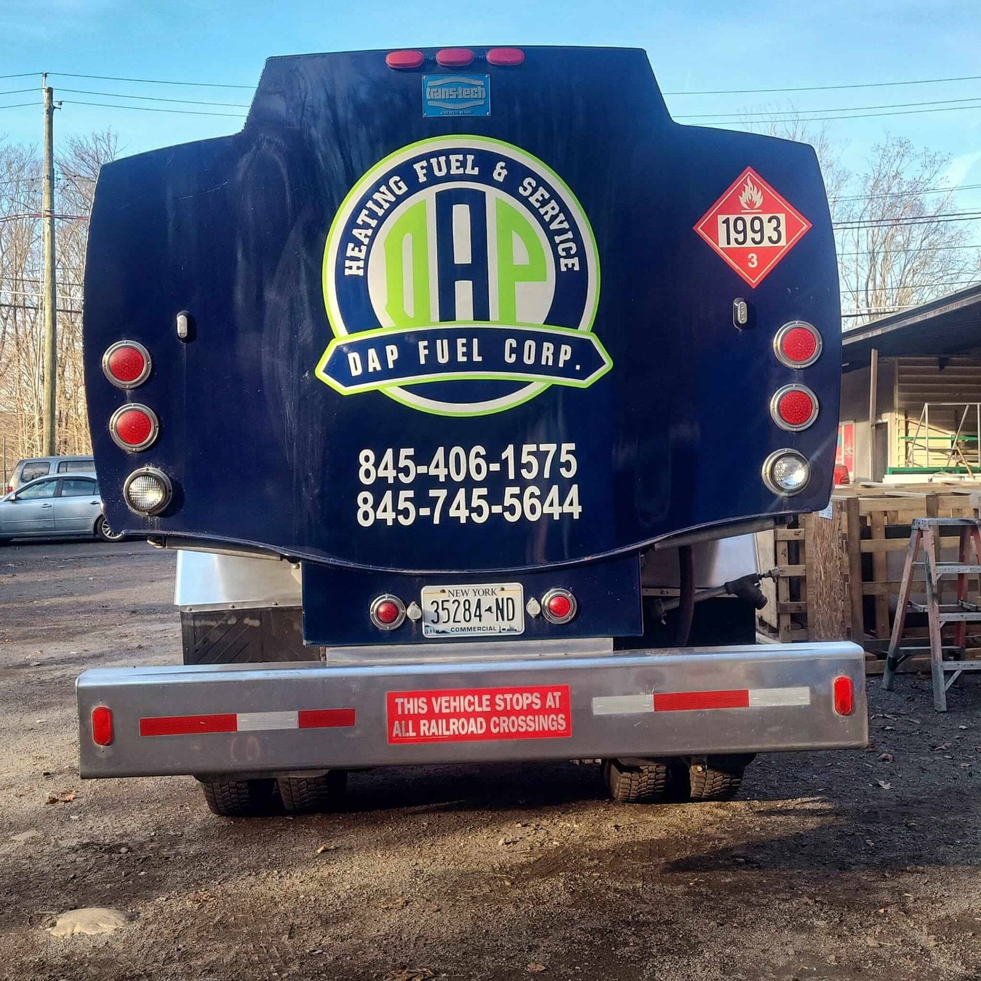 The back of a fuel truck with the year 1993 on it