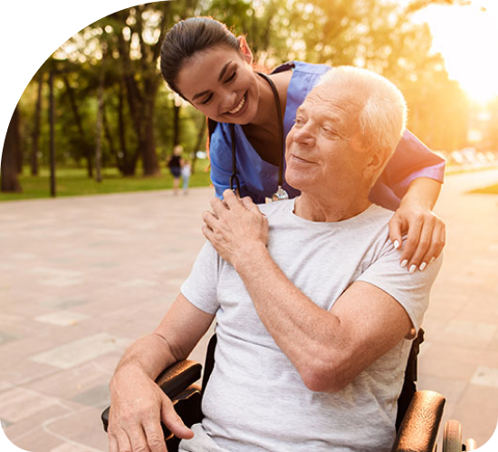 Nurse Taking Care of Patient in Wheelchair - AristaCare