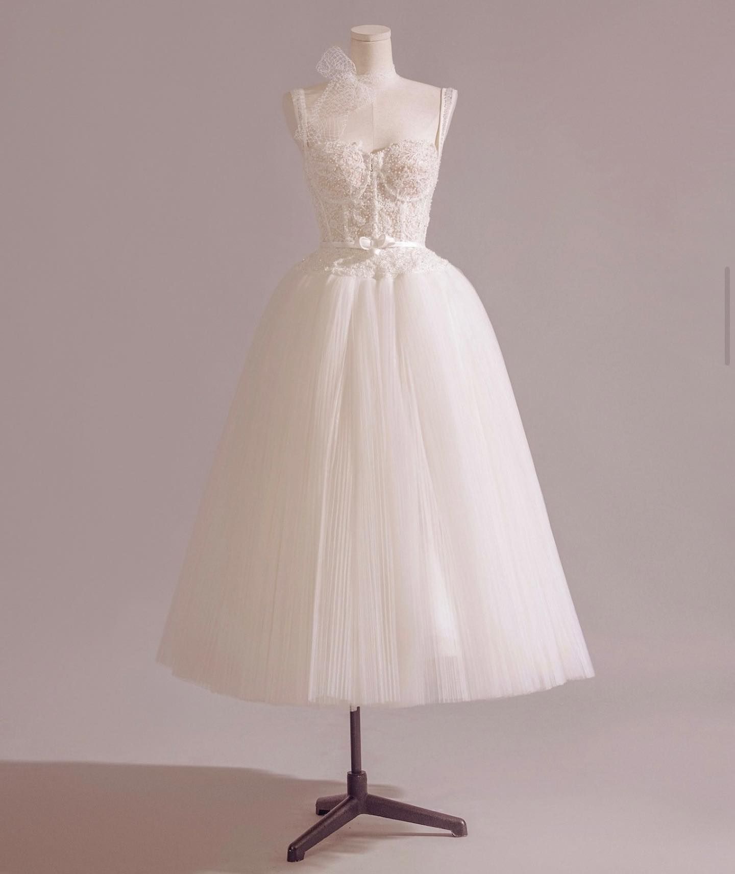 A White Wedding Dress Is On A Mannequin — Eternal Weddings & Couture In Woolner, NT