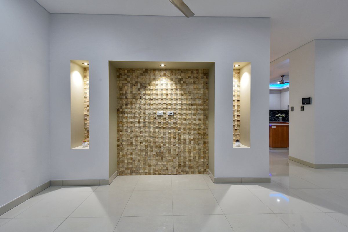 There is a stone wall in the middle of the room.