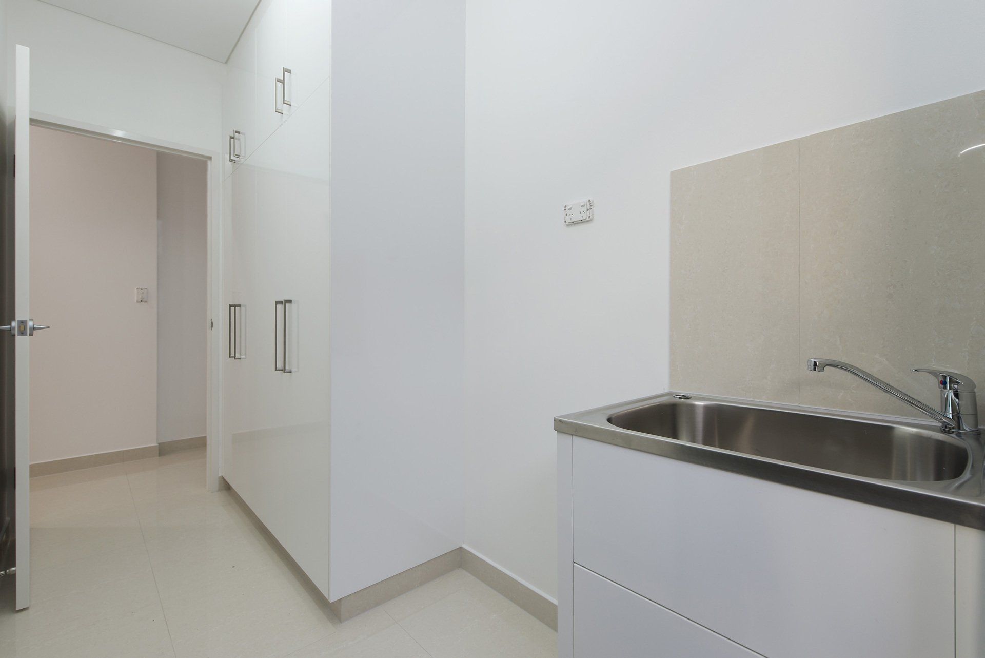 There is a sink in the middle of the room.