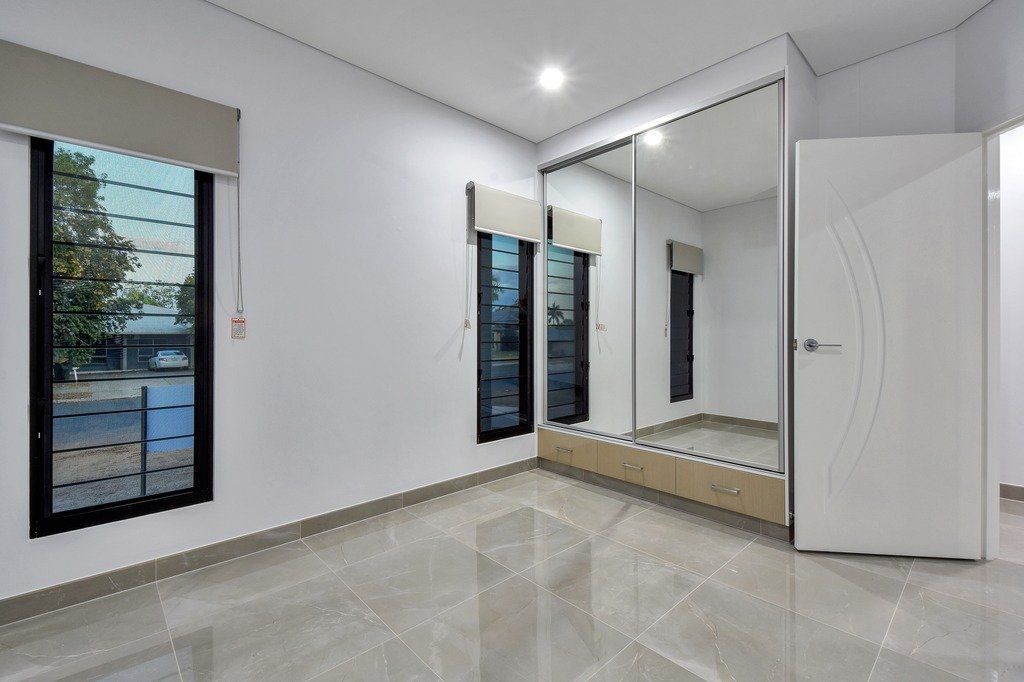 There is a large mirror in the middle of the room.