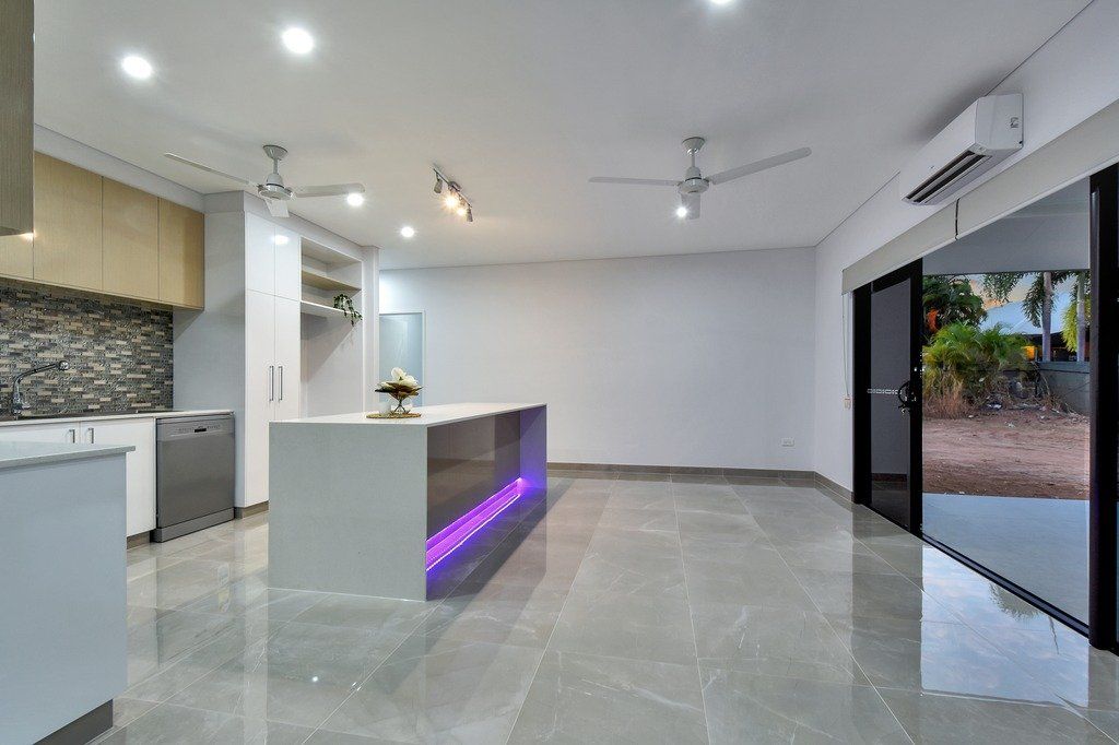 There is a large island in the middle of the room.