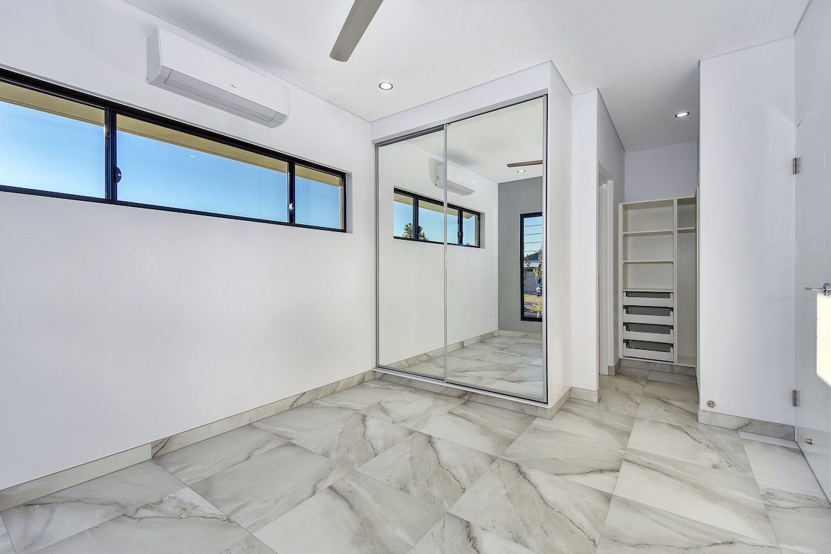 There is a large mirror in the middle of the room.