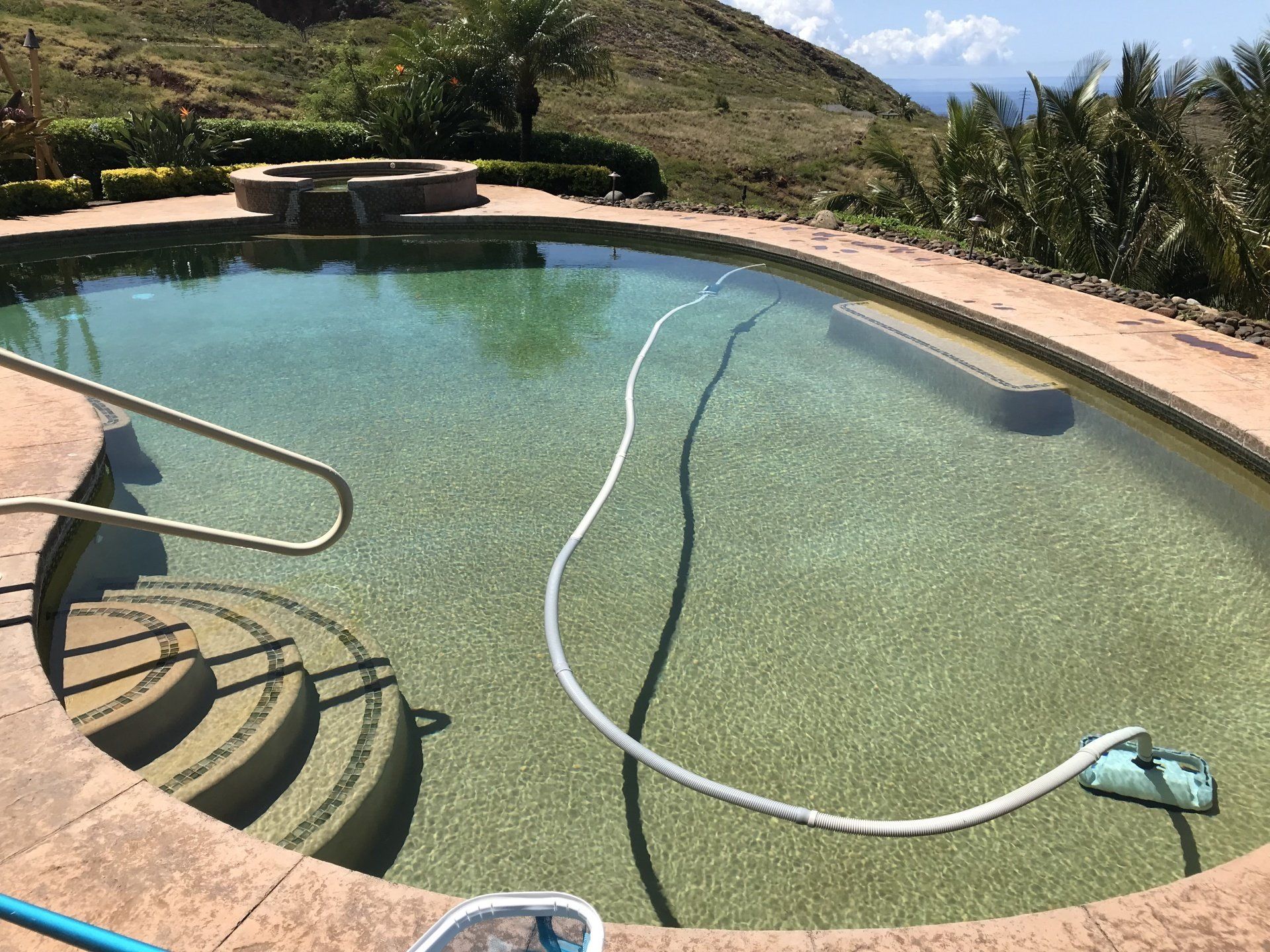 pool cleaning in progress