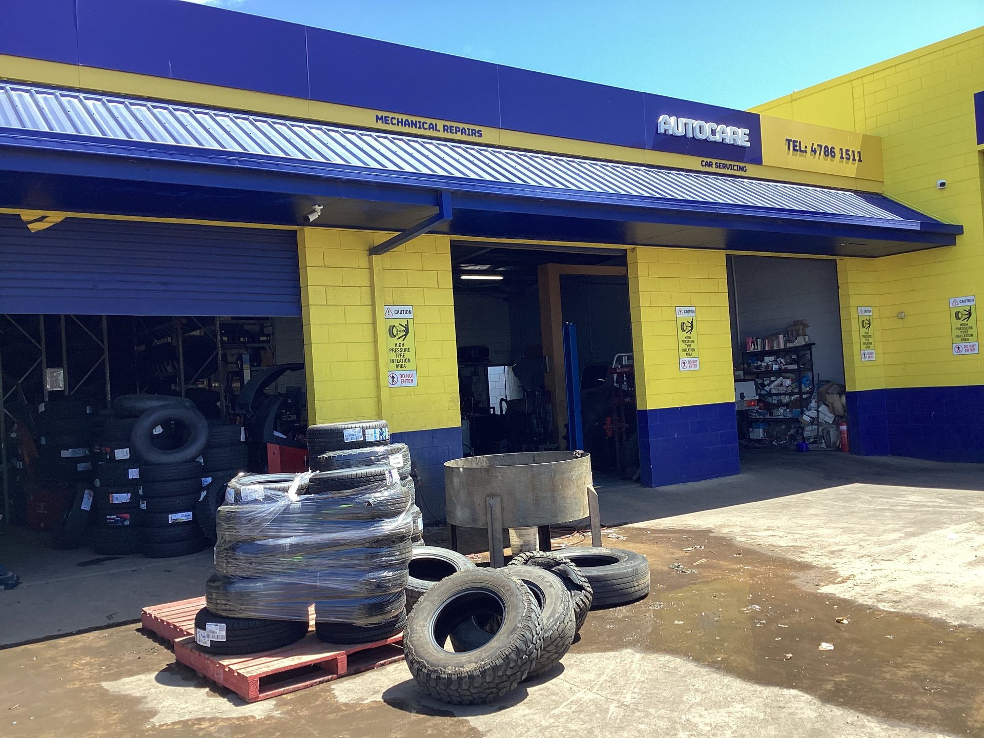 A Bunch Of Different Types Of Car Parts Are Sitting On A Table — Goodyear Autocare Bowen in Bowen, QLD