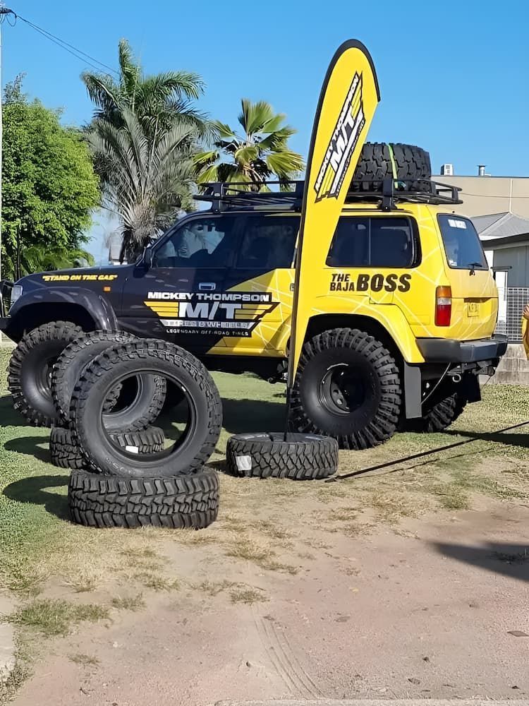 A Yellow And Black Jeep With The Word Boss On The Back — Goodyear Autocare Bowen in Bowen, QLD