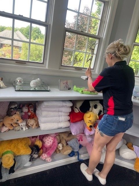 Man Cleaning Dry Leaves — Erie, PA — Peterson’s Property Maintenance