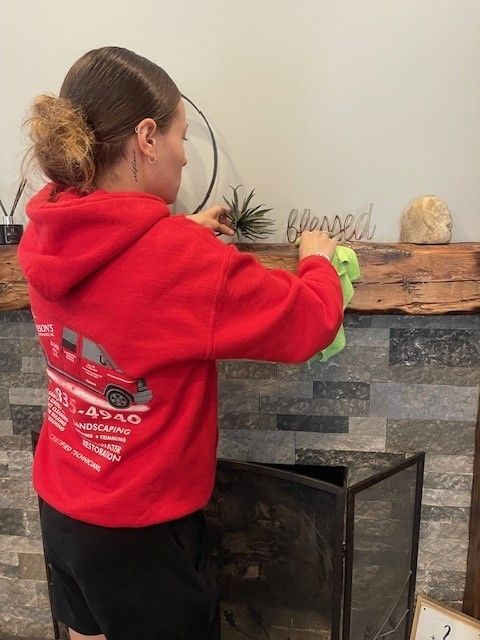 Two Men Cleaning on The Residential Lawn — Erie, PA — Peterson’s Property Maintenance