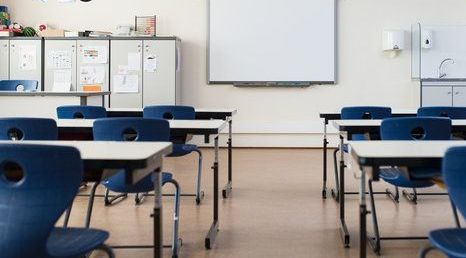 Man Trimming Lawn — Erie, PA — Peterson’s Property Maintenance