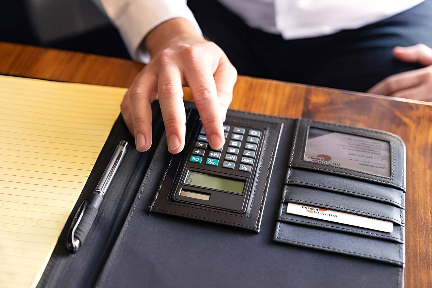 Accountant Calculating Tax Return — Whitson Dawson Accountants in Mackay, QLD