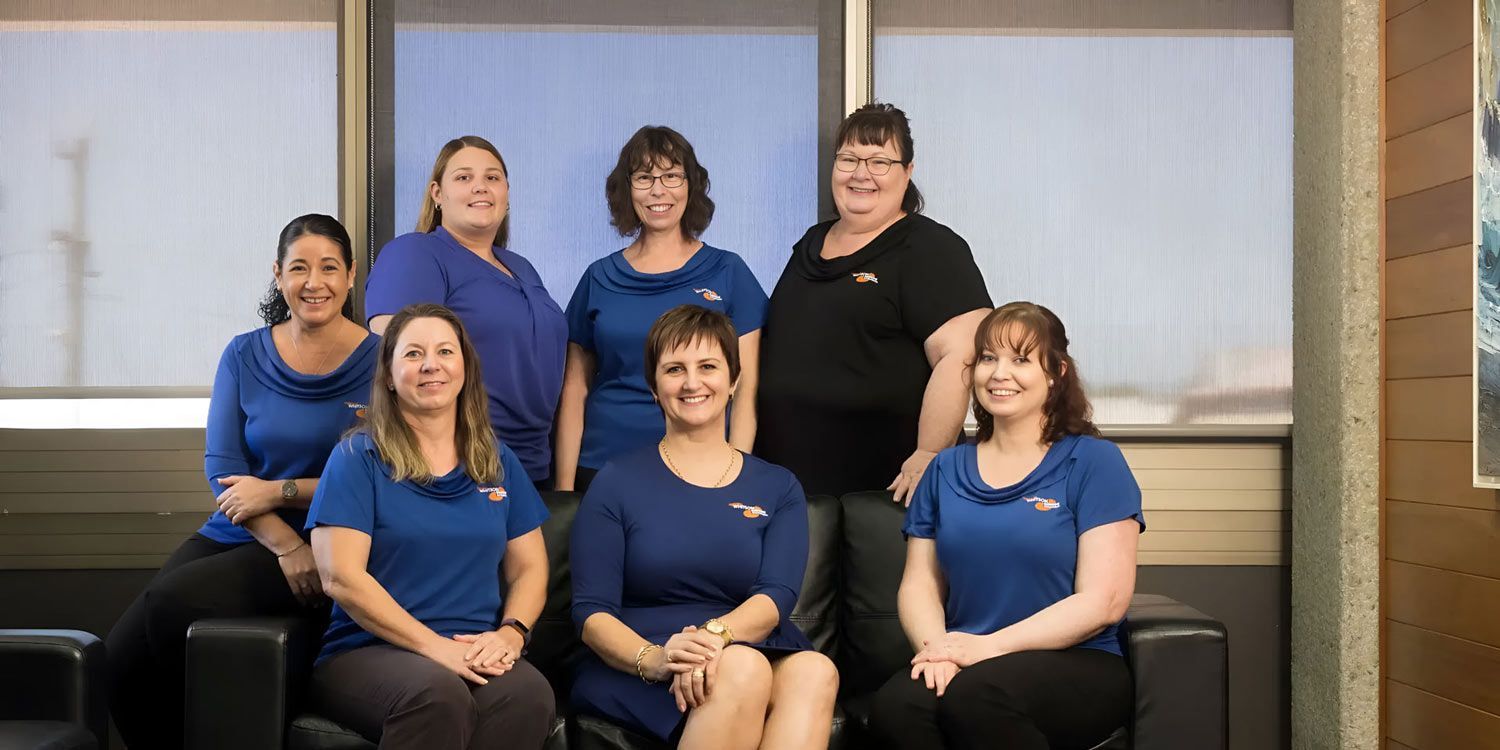 Group Whitson Dawson Accountant Woman — Whitson Dawson Accountants in Mackay, QLD