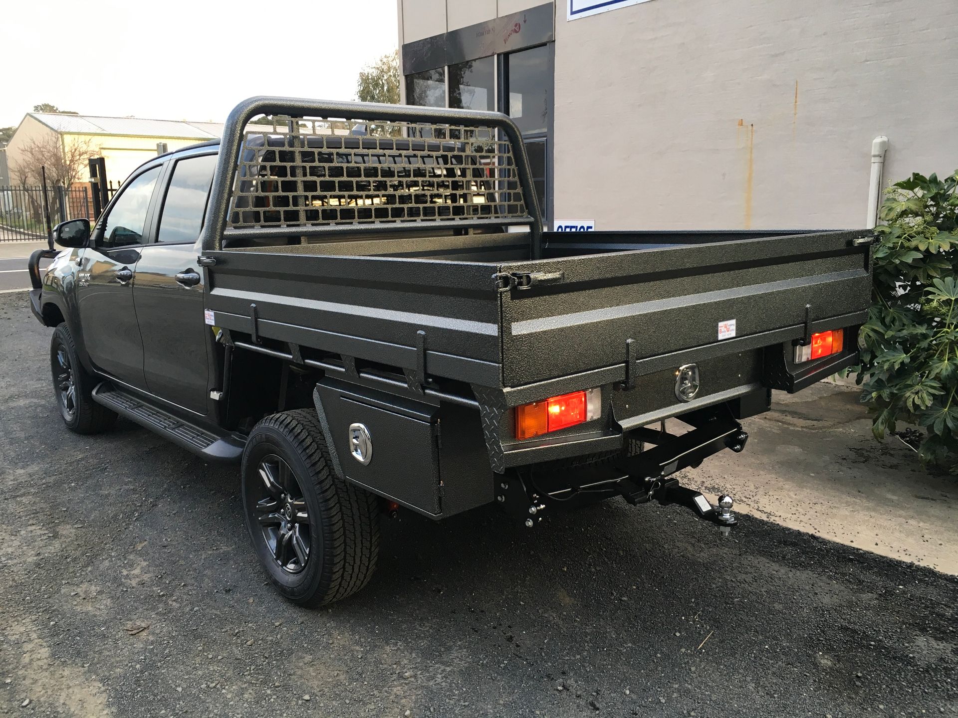 A White Truck With A Black Tarp On The Back — Bathurst Welding & Body Works In Bathurst, NSW
