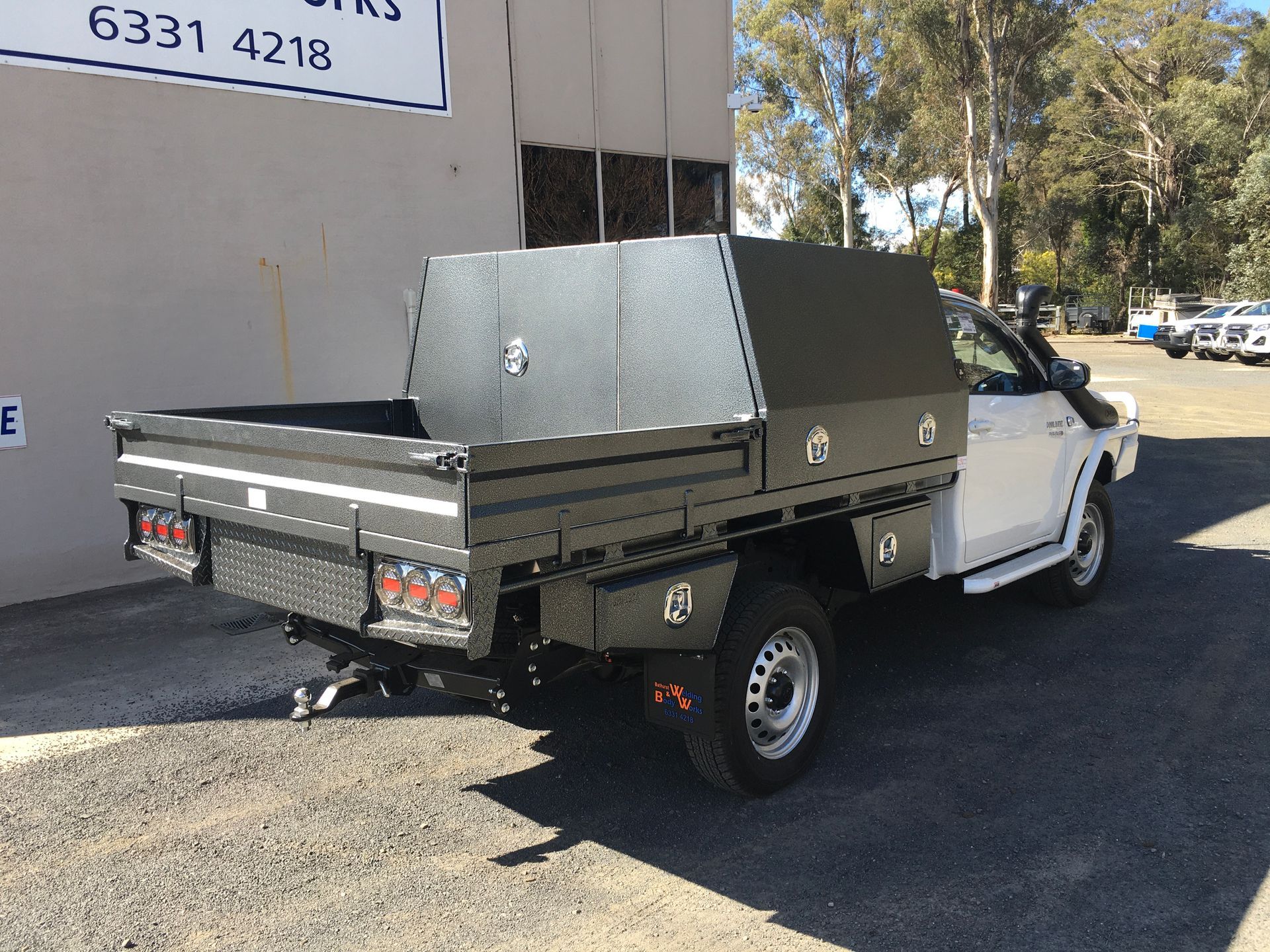 A white ute with a black tray — Bathurst Welding & Body Works In Bathurst, NSW