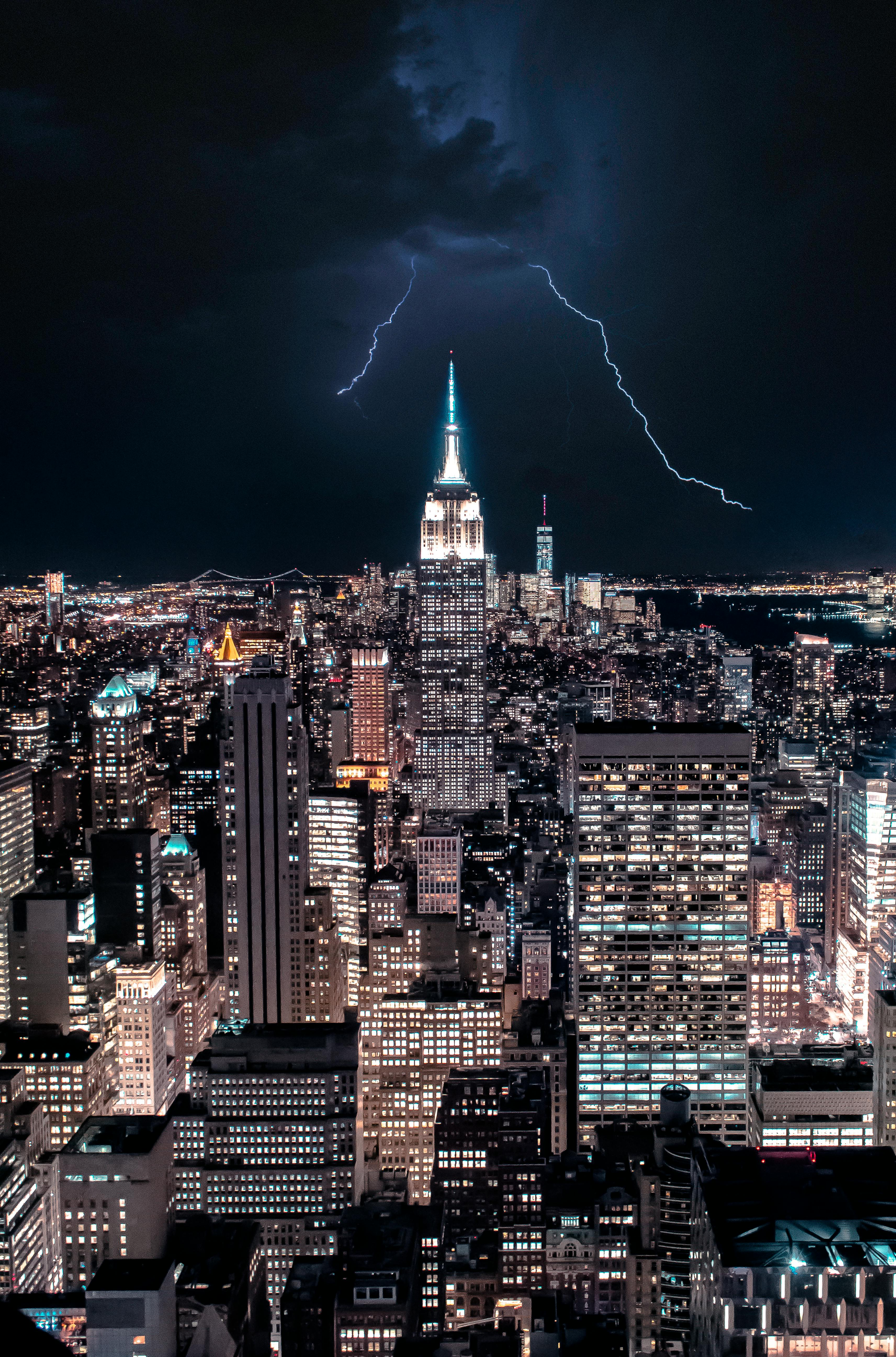 Lightning strikes over the empire state building in new york city