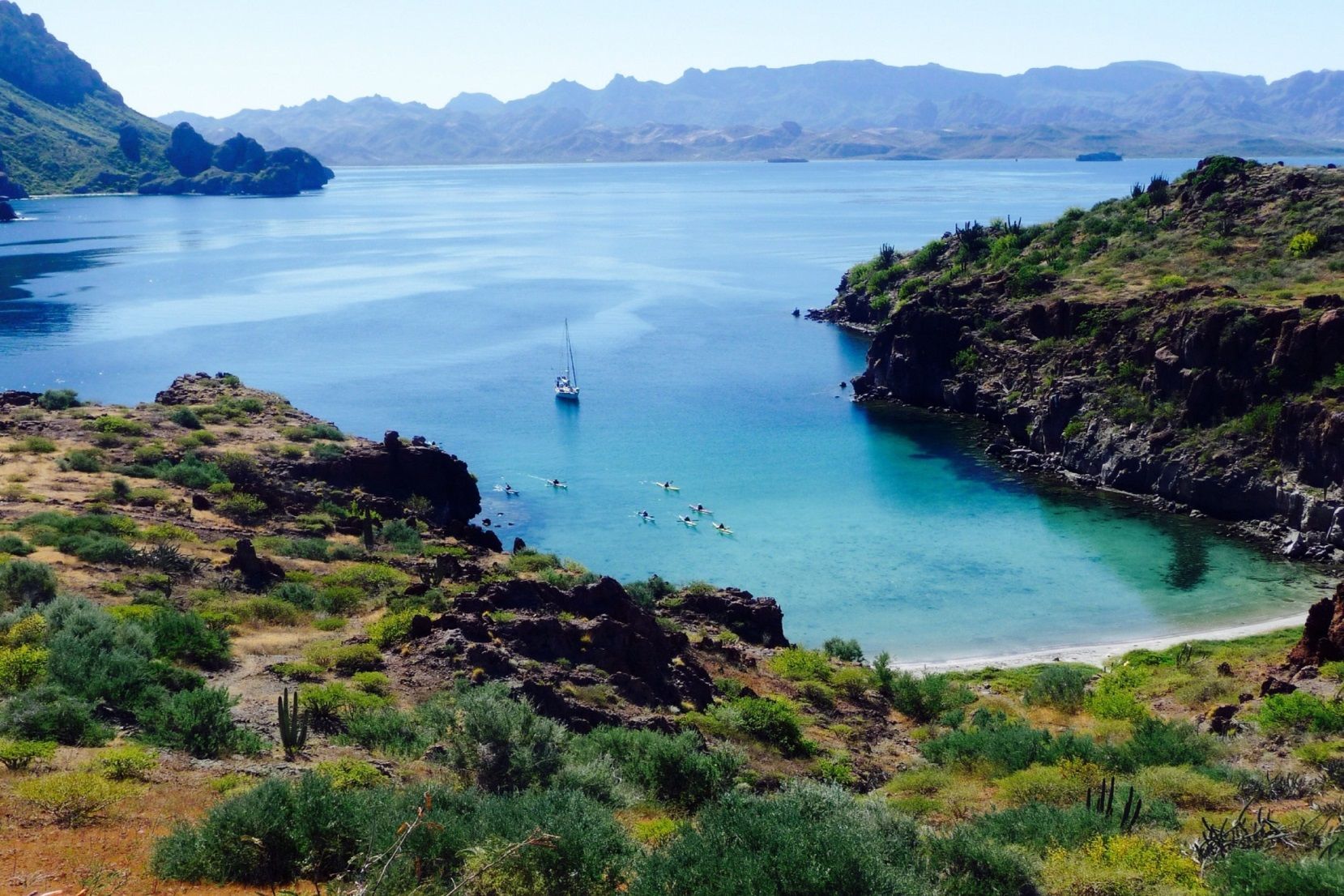 A large body of water with a boat in it