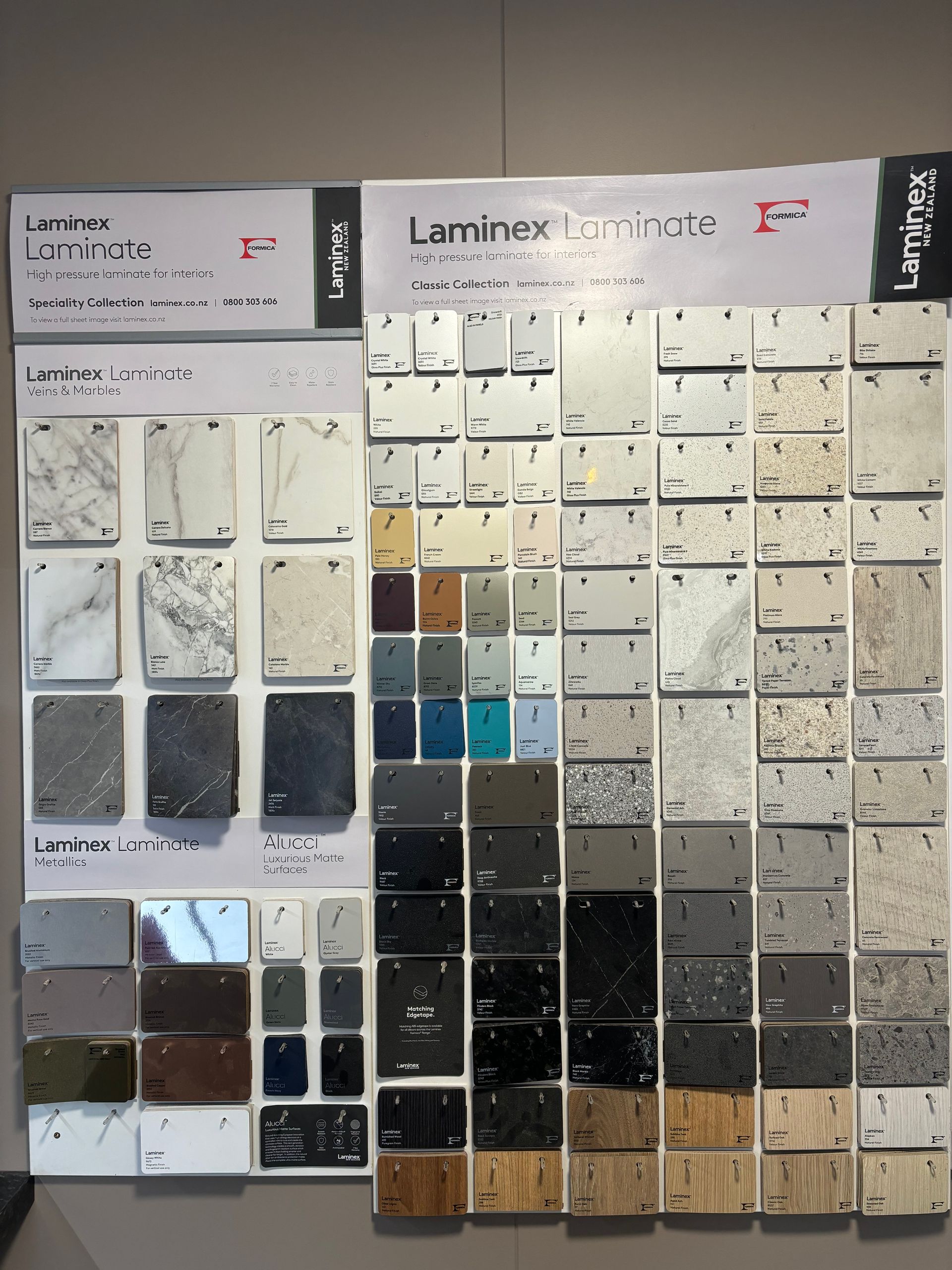 A display of laminate samples with a sign that says laminate