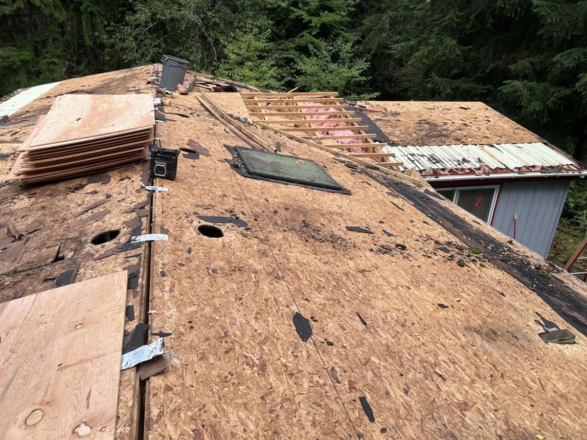 The roof of a house is being remodeled.