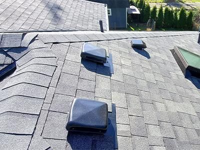 A roof with a lot of skylights on it