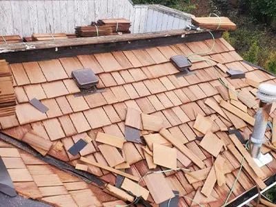 A roof with a lot of wooden shingles on it