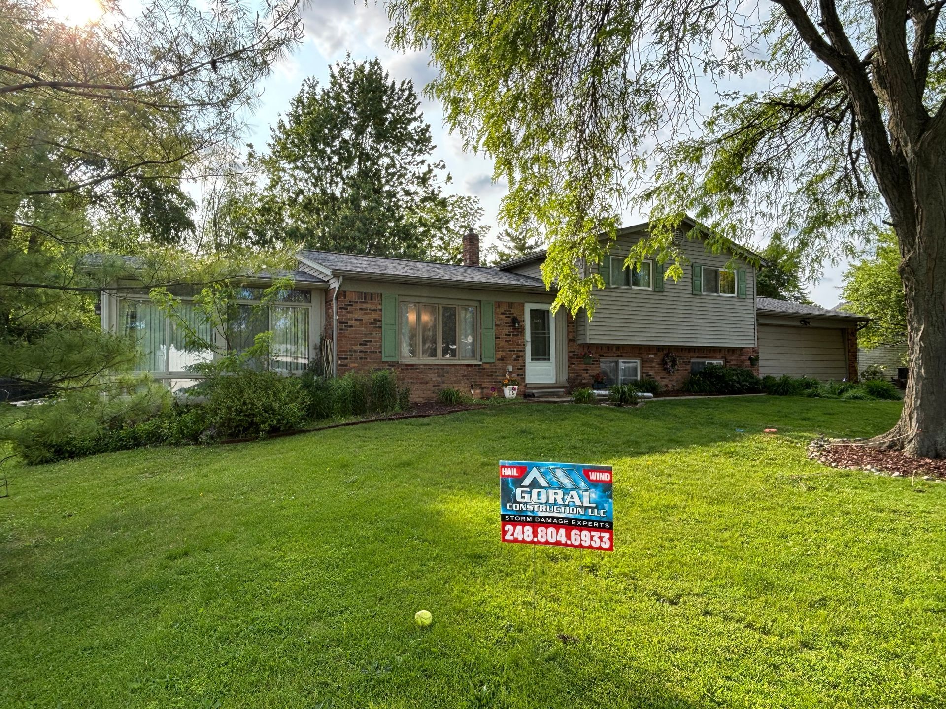 Roofing contractor working on roof in Waterford Michigan