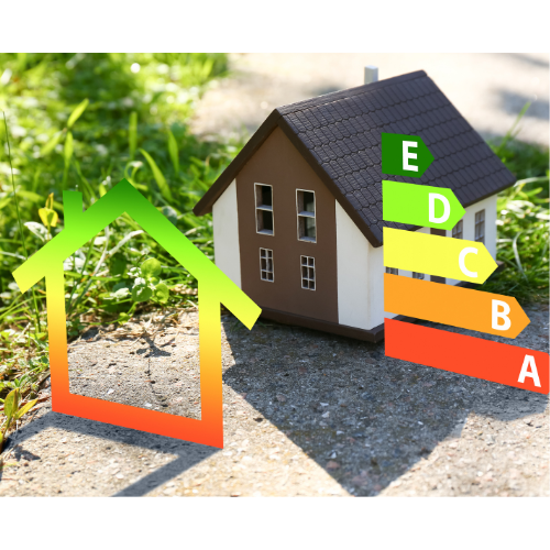 A model house is sitting on the ground next to a row of energy ratings.