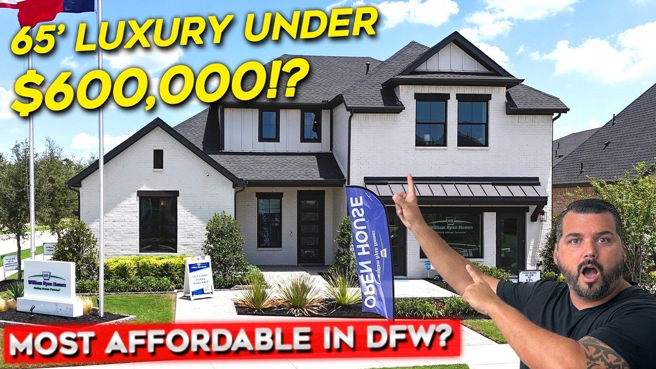 Man pointing to a two-story white house with the text 