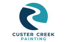 A blue and white logo for custer creek painting