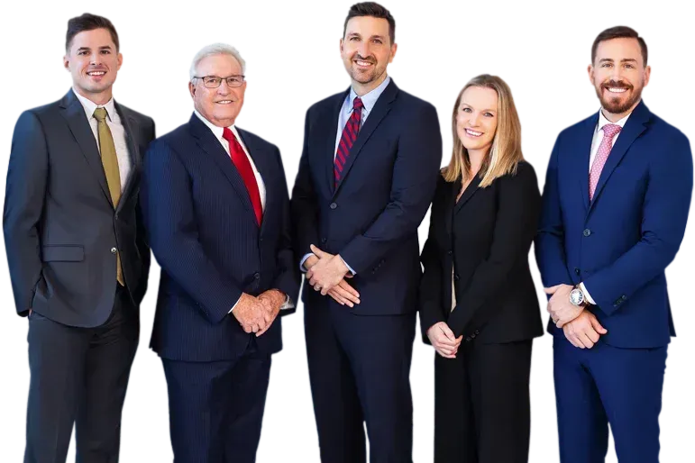 A group of people in suits and ties are posing for a picture.