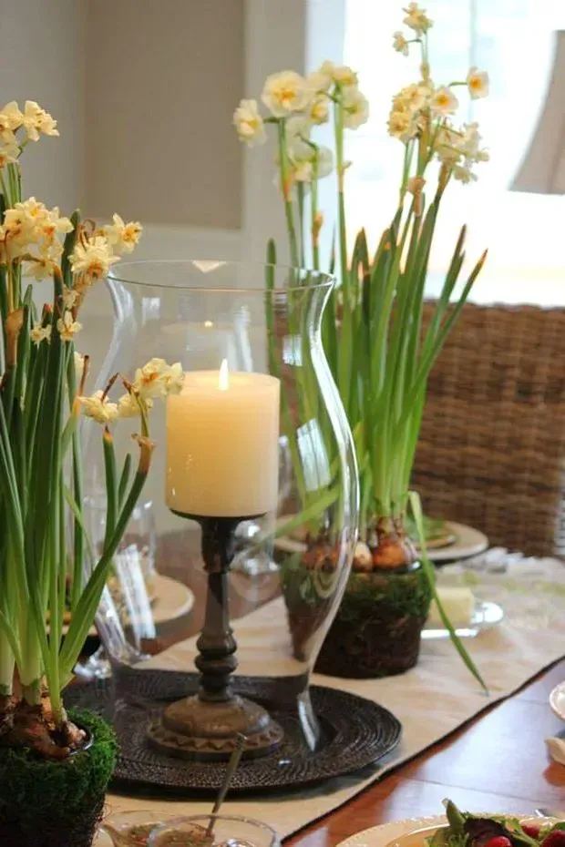 A table with flowers and a candle
