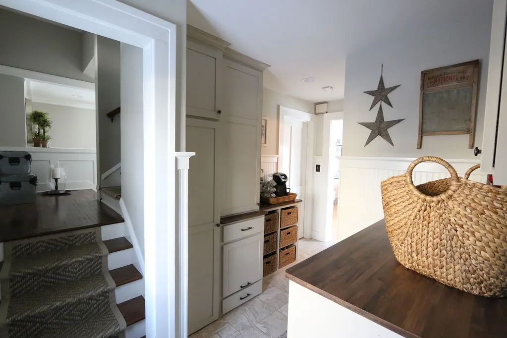 A wicker basket sits on a counter in a kitchen