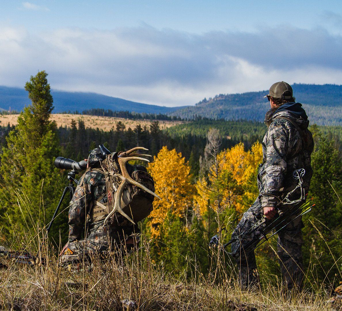 men dressed in camouflage hunting