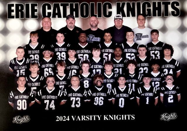 A group of girls are posing for a picture on a basketball court.