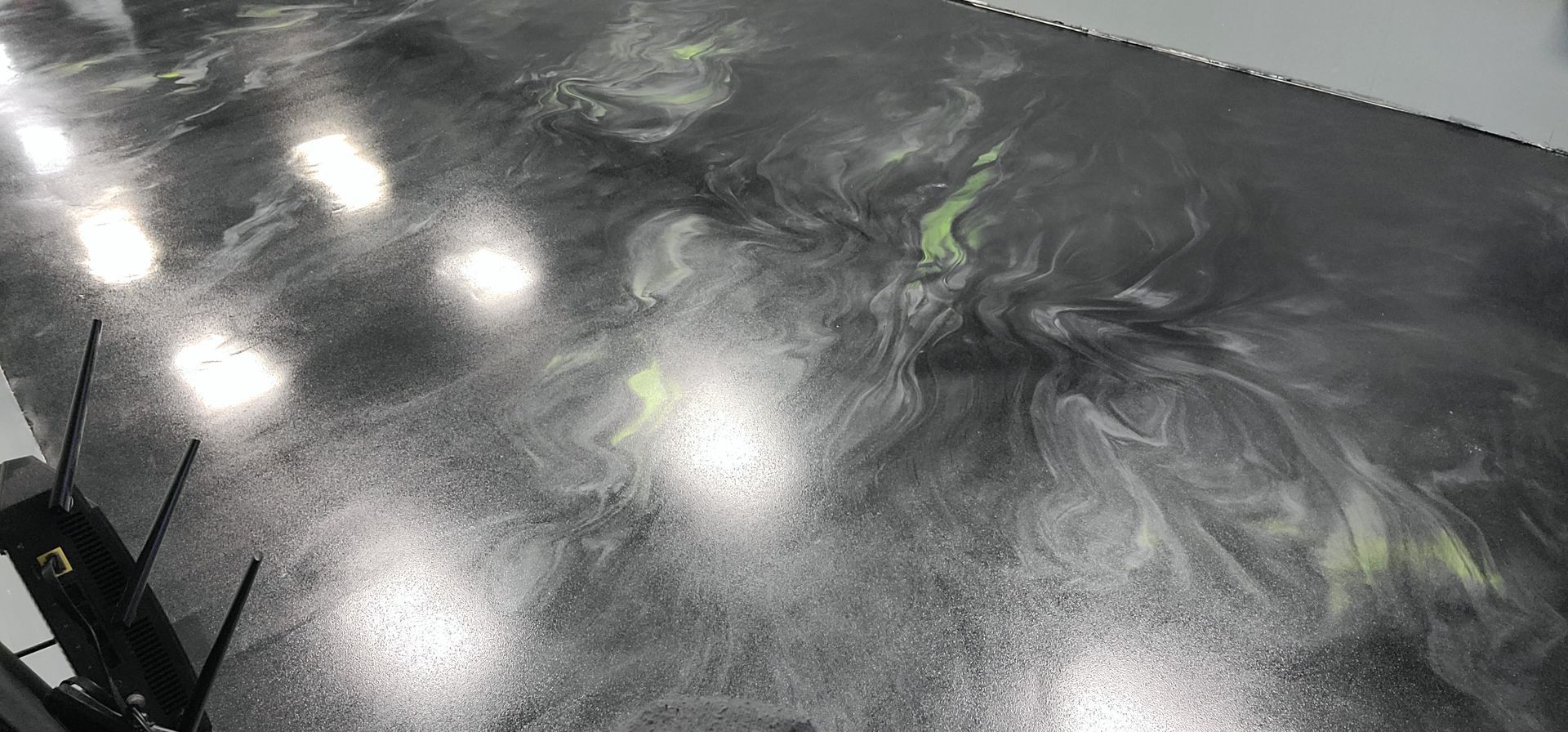 Photo of a gleaming metallic epoxy floor from Best Choice Flooring in DE & PA