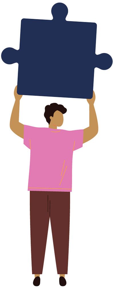 Person holding puzzle piece