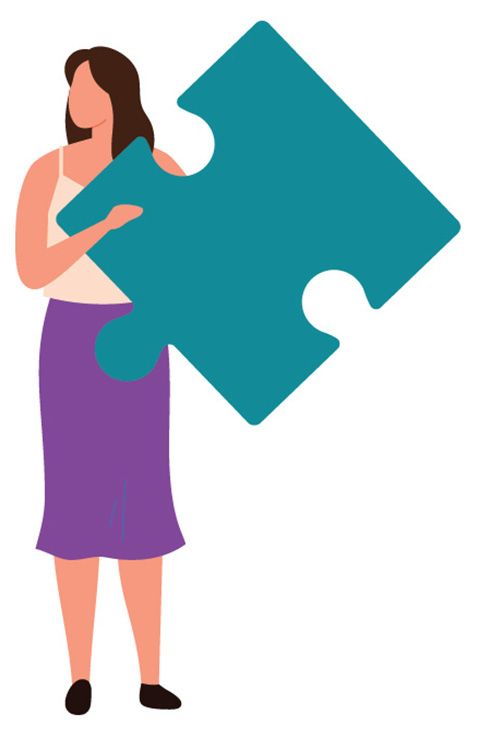 Person holding puzzle piece