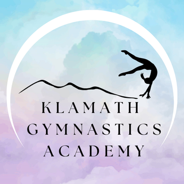 Logo for Klamath Gymnastics Academy with a gymnast in a handstand over a mountain outline, set against a pastel background.