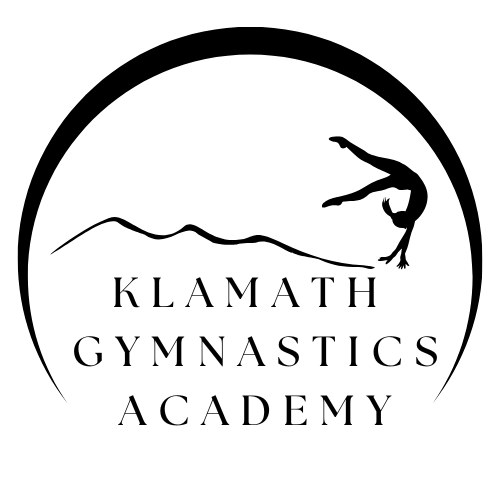 Logo for Klamath Gymnastics Academy. A gymnast performs a handstand within a curved outline, with mountain range and text below.