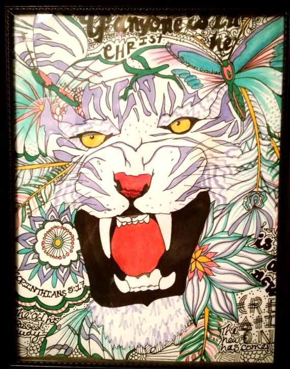 A colorful drawing of a tiger with its mouth open