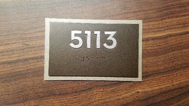Bronze room number sign 