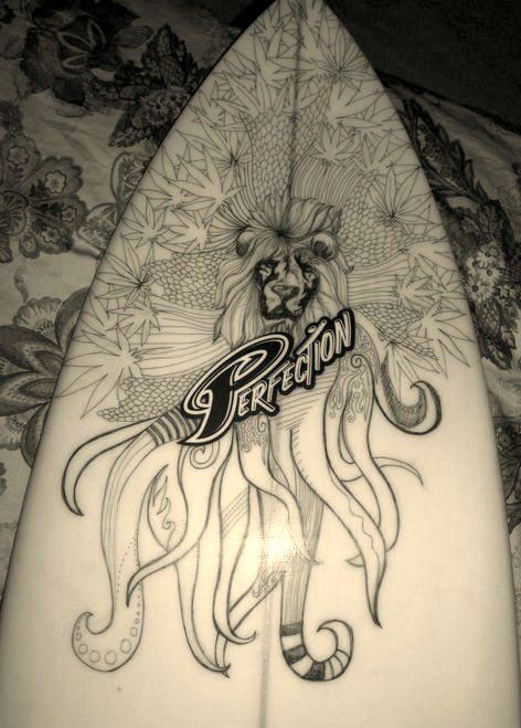 A surfboard with the word perfection on it