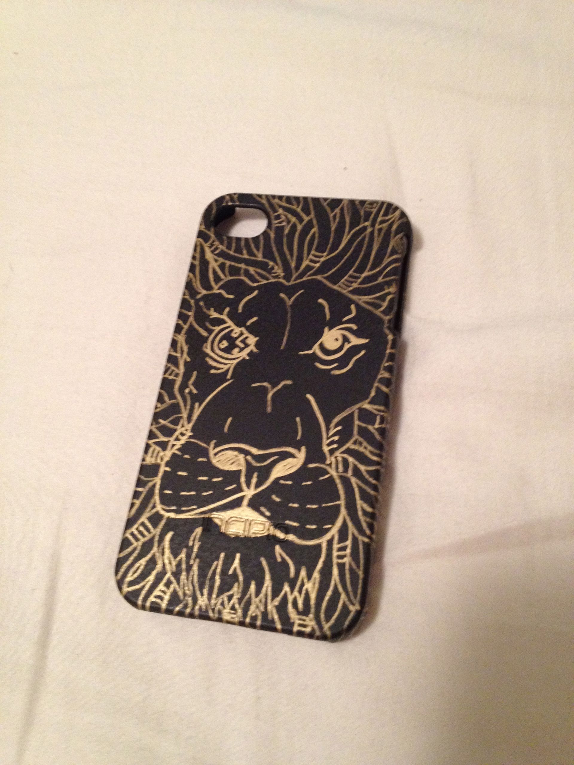 A phone case with a picture of a lion on it