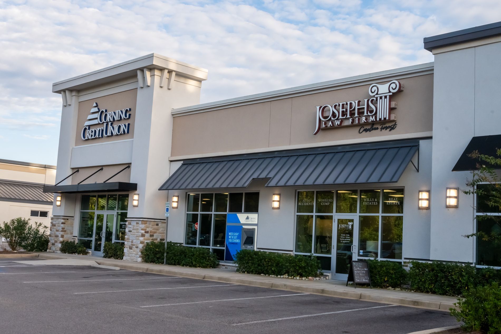 Exterior of two businesses illuminated channel building letters and logos for a credit union and law firm in SC.