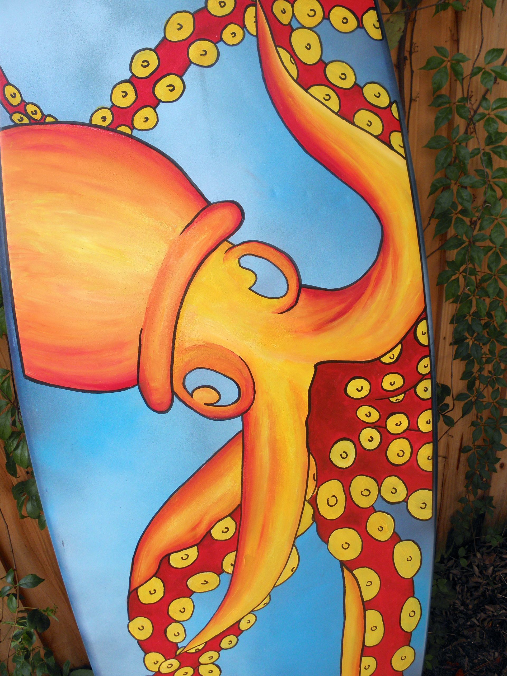 A painting of an octopus on a surfboard