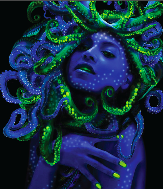 A woman with glow in the dark octopus paint on her face