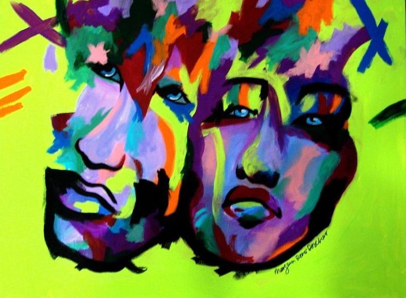 A colorful painting of two faces on a green background