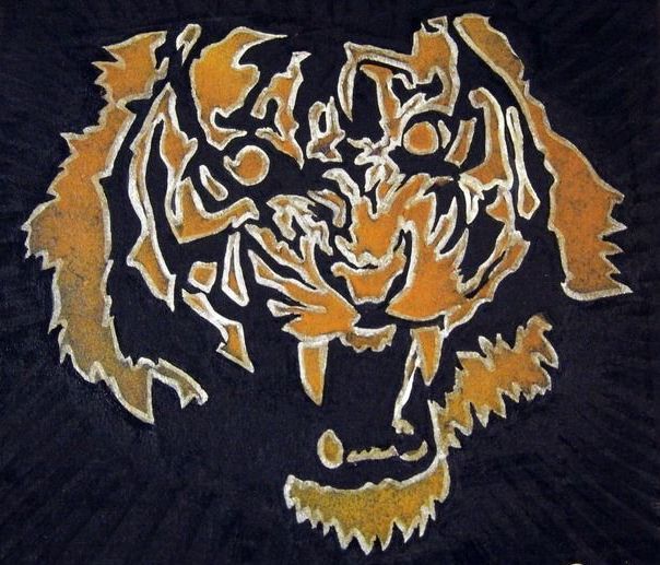 A drawing of a tiger 's face on a black background