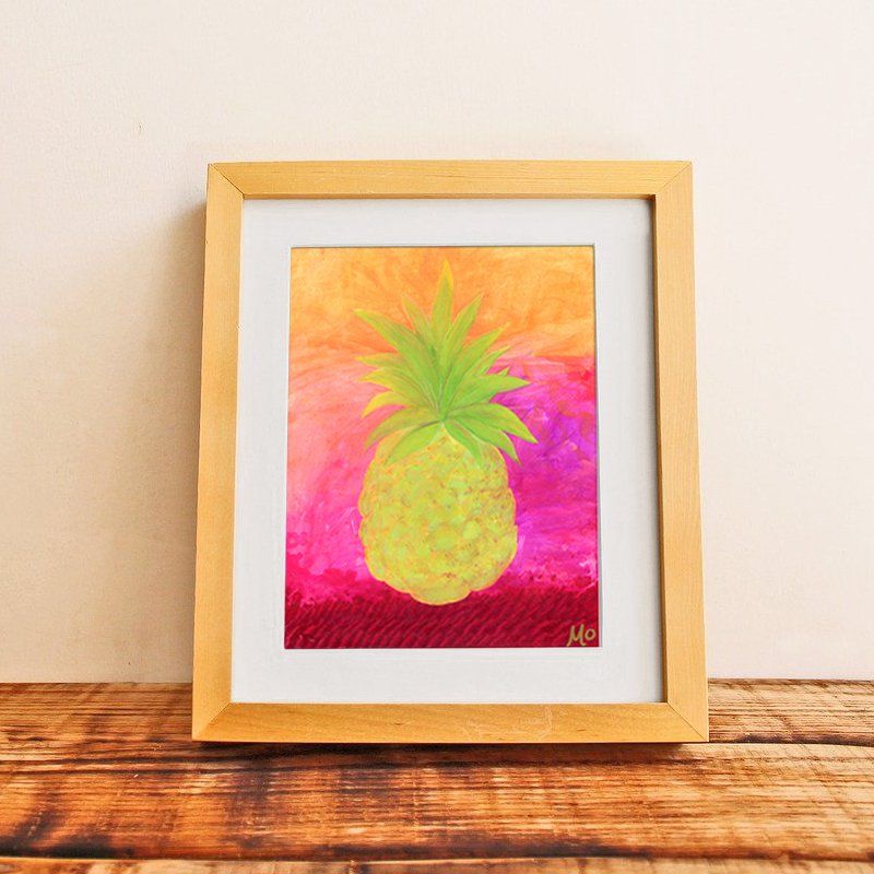A framed painting of a pineapple on a wooden table.