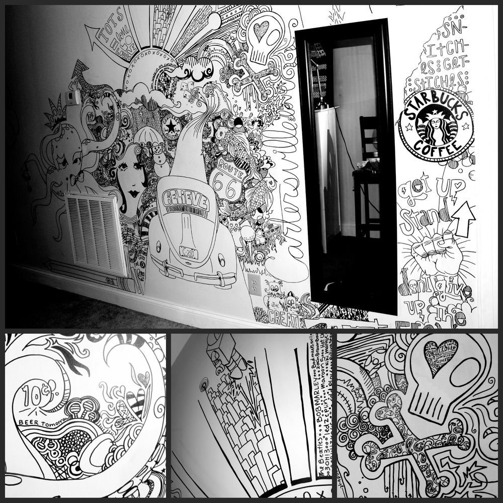 A black and white drawing of a starbucks logo on a wall