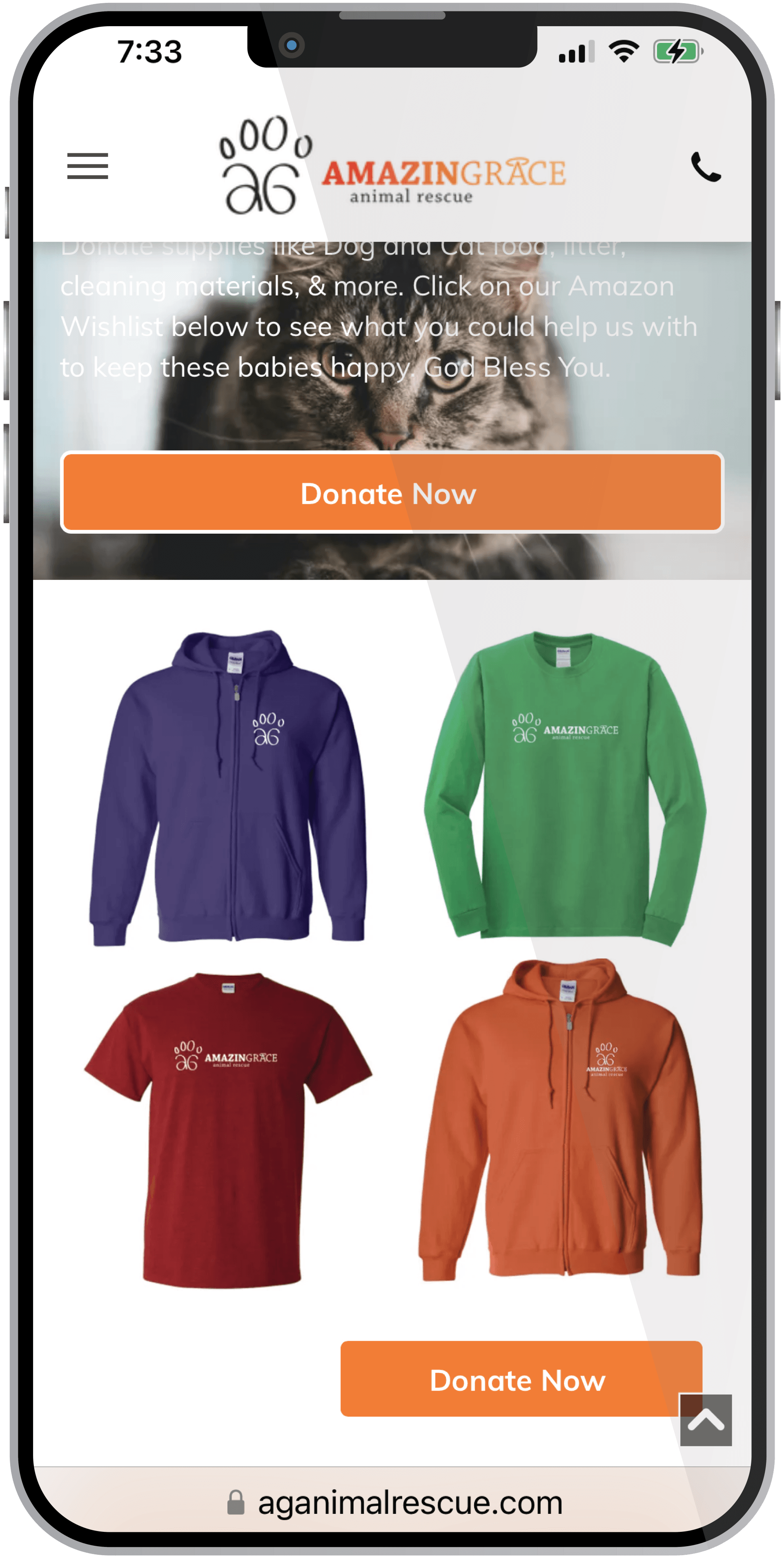 A cell phone displaying a website for a charity called amazing grace.